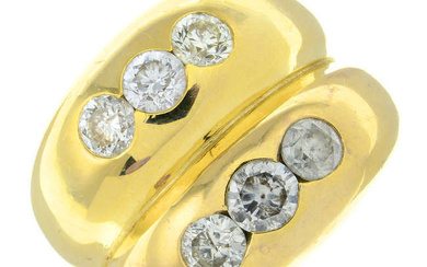 A brilliant-cut diamond two-row band ring.