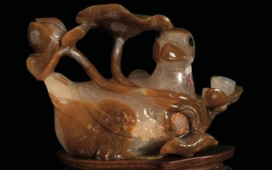 A carved agate group, China, Qing Dynasty, 1800s