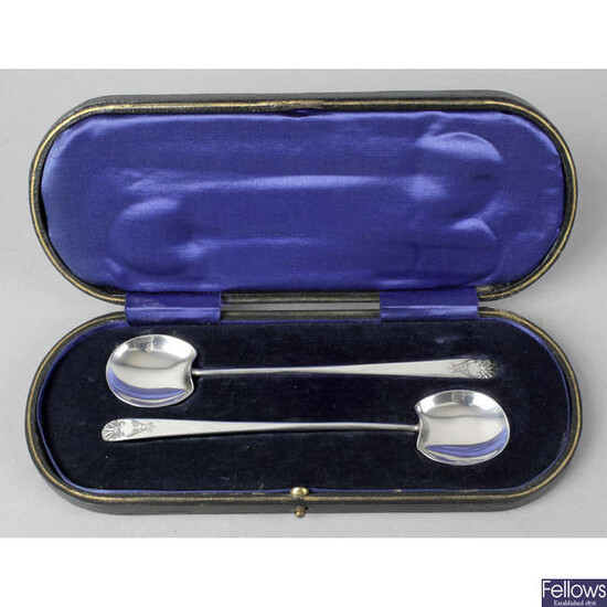 A cased pair of Art Nouveau style silver spoons.