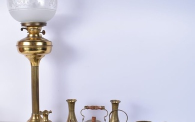 A collection of Central Asian brass items , together with a brass oil lamp with an etched glass shad
