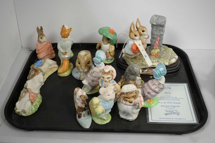 A collection of ceramic Beatrix Potter figures
