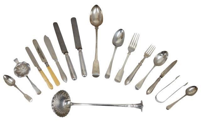 A collection of silver flatware, including a...