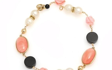 SOLD. A coral bracelet set with numerous corals, cultured pearls and onyxes, mounted in 18k gold. L. app. 20 cm. – Bruun Rasmussen Auctioneers of Fine Art