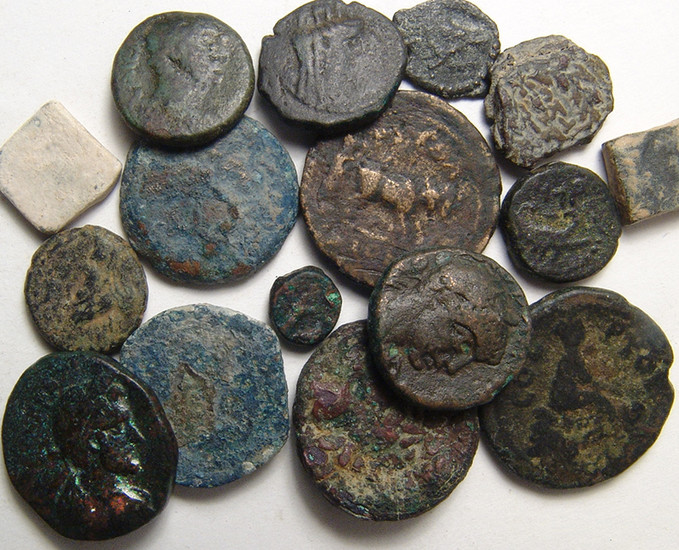 A group of 16 coins and weights from the Holy Land