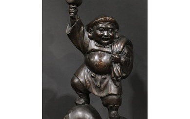 A large Japanese bronze figure, Daikokuten, the syncretic Ja...