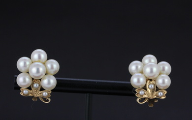 A pair of 14ct yellow gold (marked 14K) clip back earrings set with cultured and seed pearls, L. 2cm.