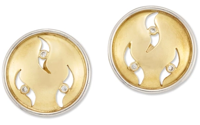 A pair of 18ct gold diamond set stud earrings, of...