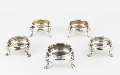 A pair of George II silver circular salts, on stepped...