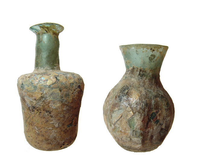 A pair of blue-green Late Roman glass vessels