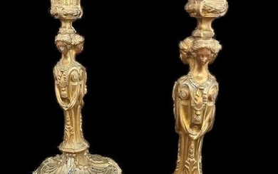 A pair of candlesticks after a model by Pierre Gouthière - Bronze (gilt) - Late 19th century