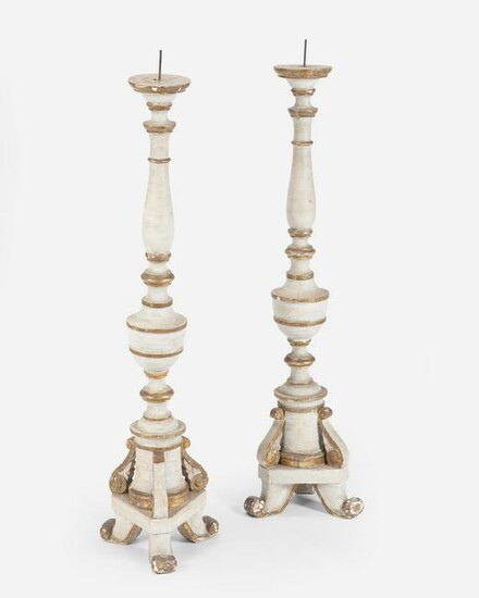 A pair of large Continental painted wood pricket
