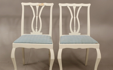 A pair of white painted, textile upholstered chairs, early 20th century.
