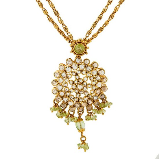 A peridot and diamond pendant necklace.