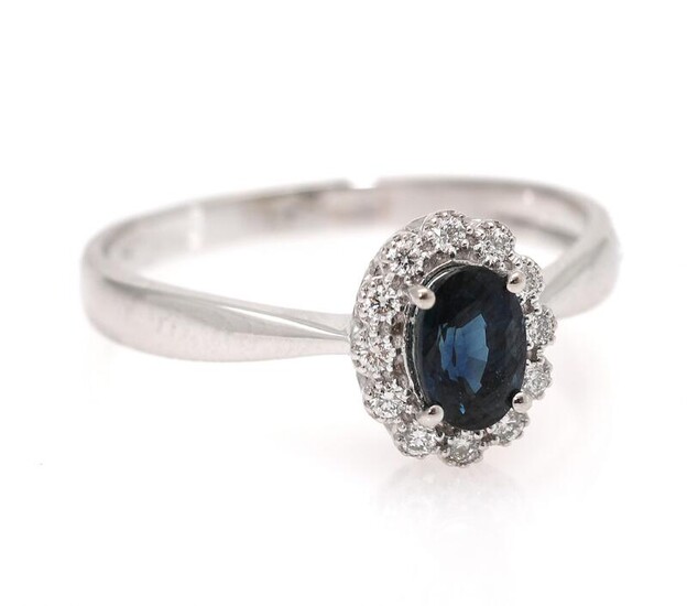 NOT SOLD. A sapphire ring set with a sapphire encircled by diamonds, mounted in 18k white gold. Size 55. – Bruun Rasmussen Auctioneers of Fine Art