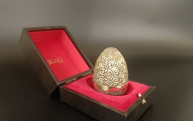 A silver gilt Easter egg, by Stuart Devlin, No 101, cased wi...
