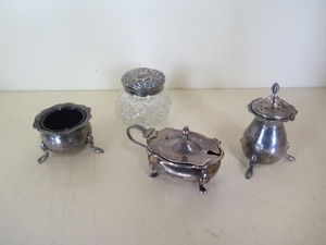 A silver top bottle and a silver cruet, total silver weight ...