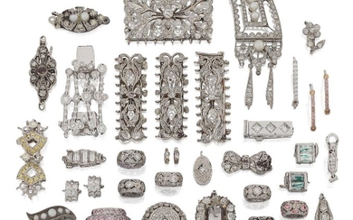 A small quantity of diamond-set jewellery fittings and clasps, clasps include: an old-brilliant-cut diamond oval cluster, centre stone deficient, numbered 44113, French import mark; a platinum, baguette diamond five stone clasp; a diamond set...