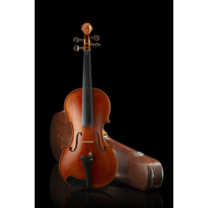 A violin by Romeo Antoniazzi, Milan 1915 ca. Two-pieces back of maple of medium curl, putto's head sculpted in the...