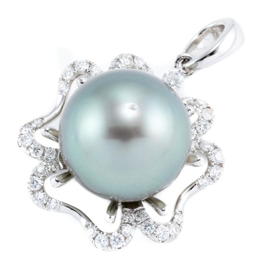 AN 18CT WHITE GOLD TAHITIAN PEARL AND DIAMOND PENDANT; featuring a 13.75mm round fine cultured pearl to a scalloped surround set wit...