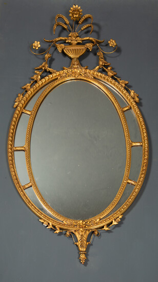 An Adam's style gilded gesso oval wall mirror