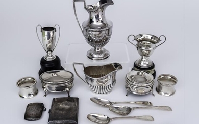 An Edward VII Silver Urn Pattern Milk Jug and...