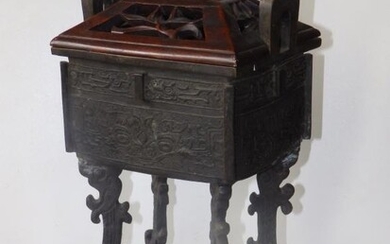 An antique Chinese archaistic bronze rectangular censer, on four...