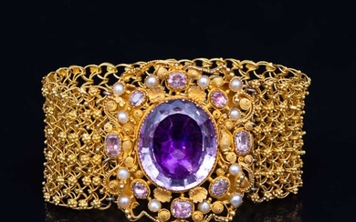 An early 19th Century gold and foil backed gem stone and pearl bracelet.