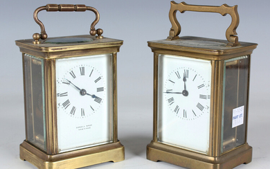 An early 20th century brass carriage timepiece by Duverdry & Bloquel, the white enamel dial with