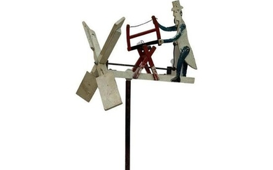 Antique Whirligig with Uncle Sam cutting a wood
