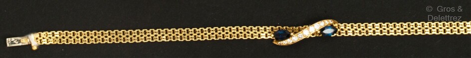 Bracelet souple en or jaune, orné d’un motif... - Lot 83 - Gros & Delettrez