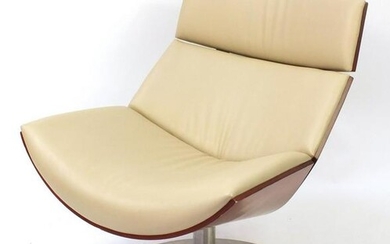 Contemporary bentwood and leather swivel lounge chair