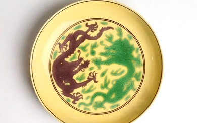 Dish - Porcelain - An Imperial Green and Aubergine-Glazed Yellow-Ground Dish, Kangxi Mark and of the Period - China - Kangxi (1662-1722)