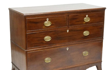 Early 19th century mahogany chest of drawers in two sections