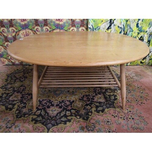 Ercol light elm circular coffee table with spindled under-ti...