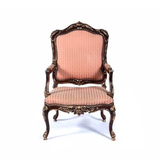 Gilt and mahogany French style open armchair