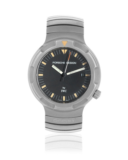 IWC with Porsche Design. A titanium automatic calendar bracelet watch