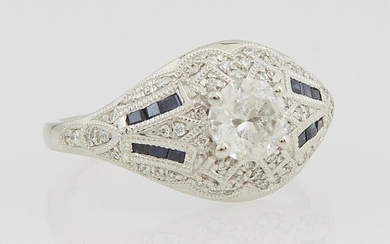 Lady's Platinum Dinner Ring, with a central .71 ct.