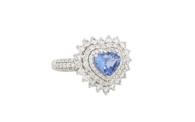 Lady's Platinum Heart Shaped Sapphire and Diamond Dinner Ring, with a 1.19 carat blue sapphire, atop