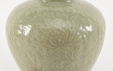 Large Chinese Ming period carved celadon porcelain vase. Carved floral decorated panels. Very heavy.