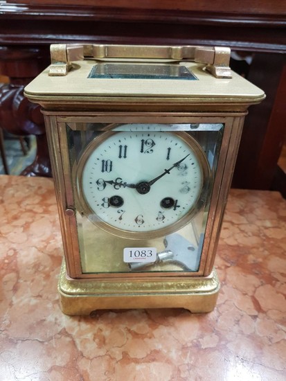 Late 19th/ Early 20th Century Brass Mantle Clock, fully glazed (one panel damaged), with white enamel dial