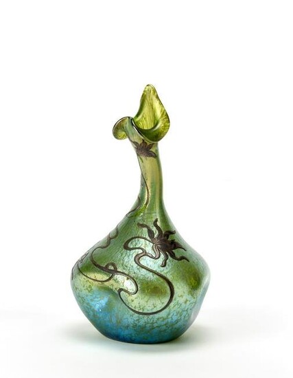 Loetz Iridescent green blown glass vase with irregular