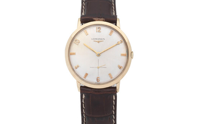 Longines. A 14K gold manual wind wristwatch Circa 1962