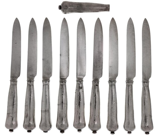 Nine 18th century cannon-handled dessert knives, together with a further detached handle, blades and handles unmarked, approx. 22.3cm long Provenance: The estate of the late designer, Anthony Powell
