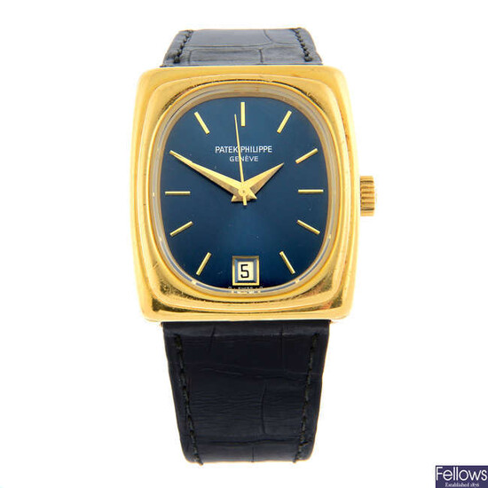 PATEK PHILIPPE - an 18ct yellow gold Beta 21 wrist watch, 33x37mm.