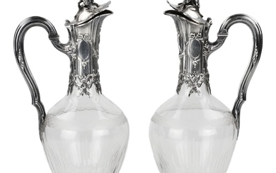 Pair of French glass wine jugs in silver. 19th century.