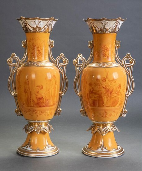 Pair of vases in Central European porcelain enamelled with classic scene decoration and curly mouth. Details in gold. c. 1900. Height: 53 cm. Exit: 350uros. (58.235 Ptas.)