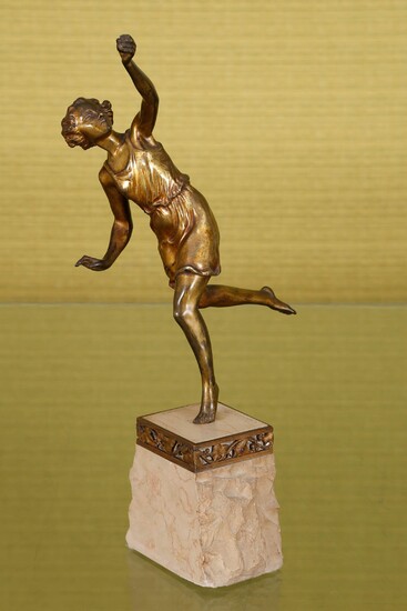 Player with a ball circa 1925 Bronze with golden patina...