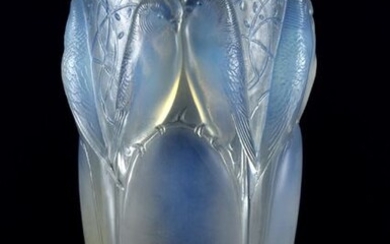 René Lalique (French, 1860 ~ 1945) 'Ceylan' Opalescent Art Deco glass vase with raised budgies around the circumference, signed R Lalique and No. 906. Circa 1930. Height 24.5 cm.