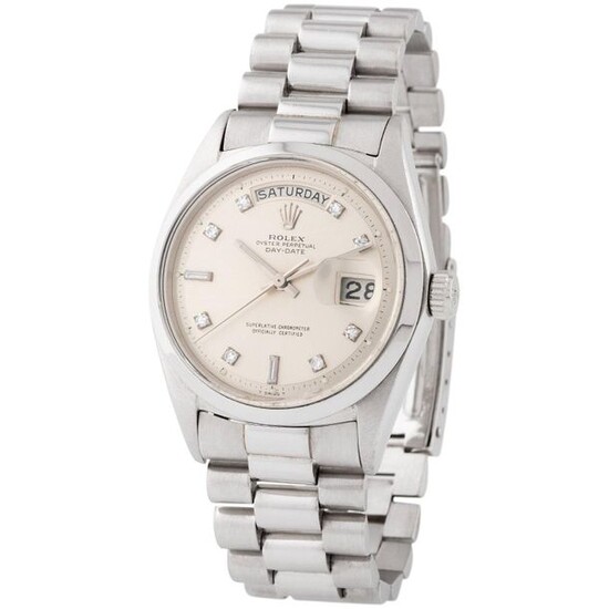 Rolex. Special and Refined Day date Wristwatch in Platinum, Reference 1802, With Diamond Set Silver Dial
