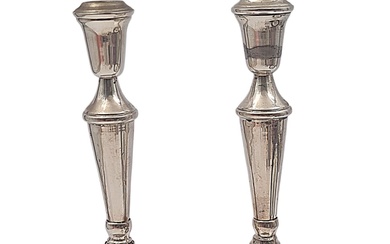 Silver candlestick holders with embossing and engraving, floral motif....